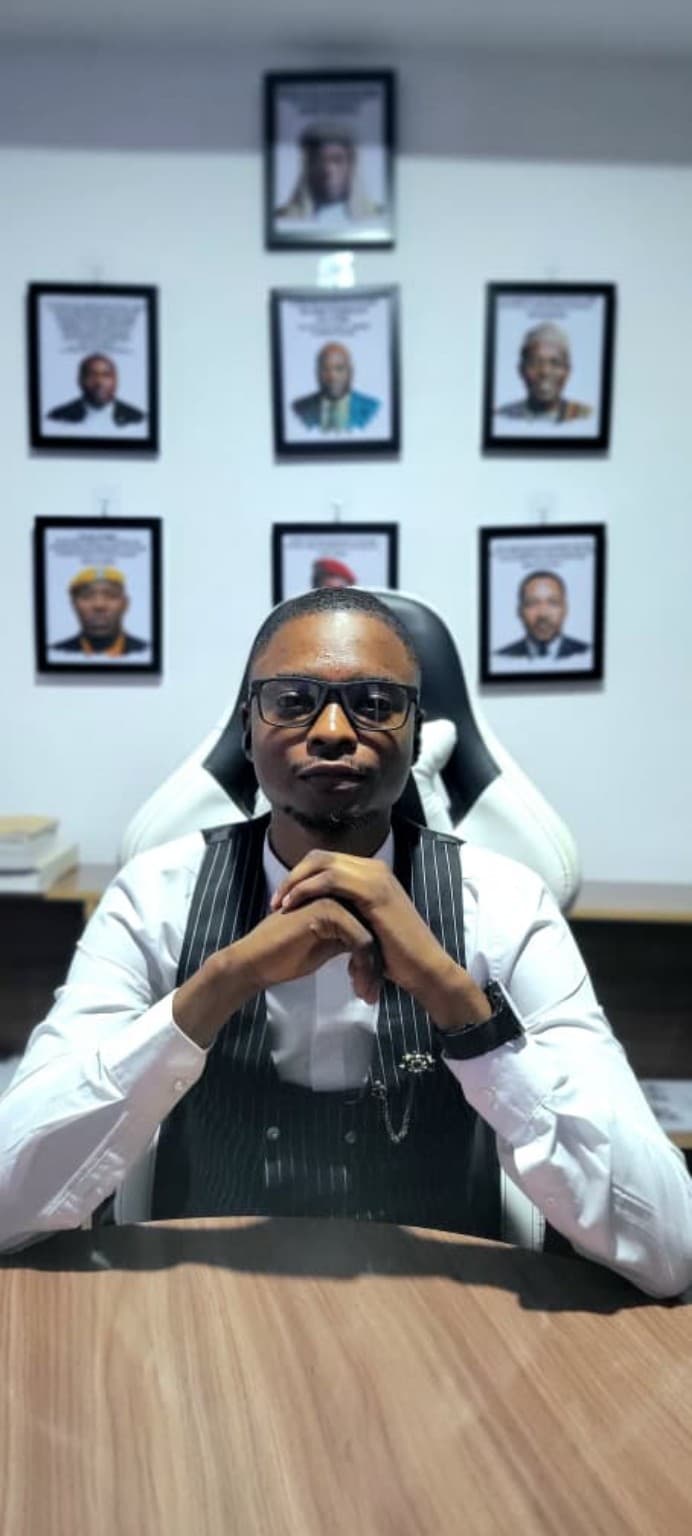 Lead practitioner at Heltavel Legal seated at a desk
